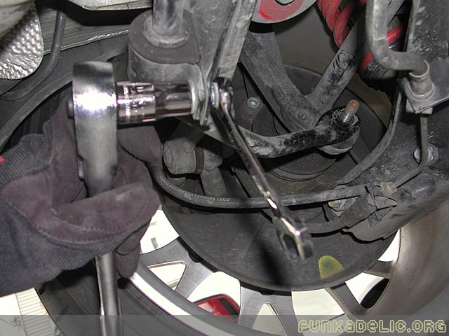 Removing the swaybar bushing clamps (driver side shown)