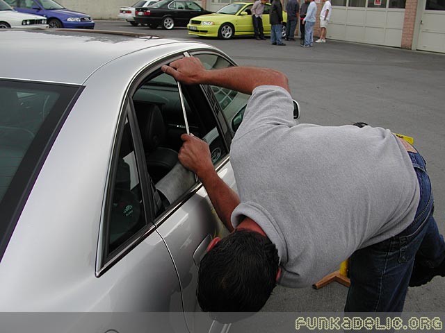 getting a small dent removed from my door courtesy of Tony from DentFree