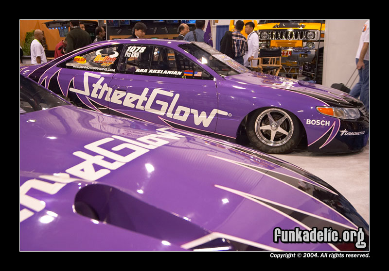 Ara Arslanian's Bullish Motor Racing Toyota Solara-based Pro RWD dragster in the background (first Pro Import driver to drive a