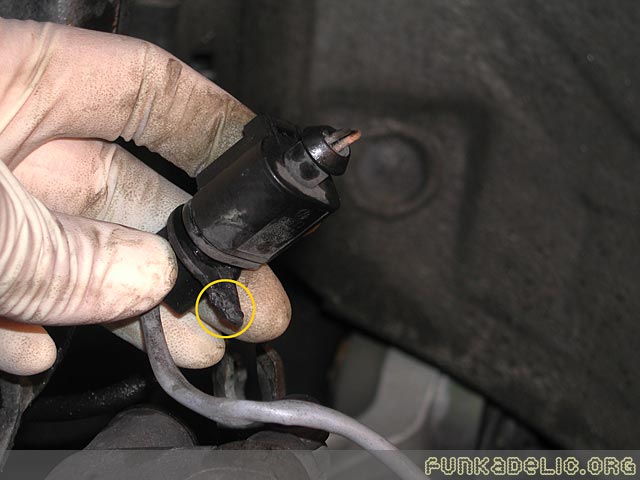 Brake pad wear sensor connector...i chewed up the securing tab nicely