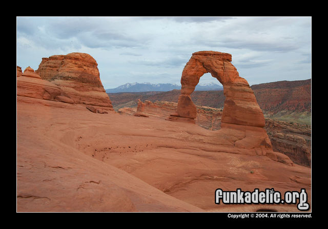 Delicate Arch near sunset, Arches NP. La Sal mountains in the background